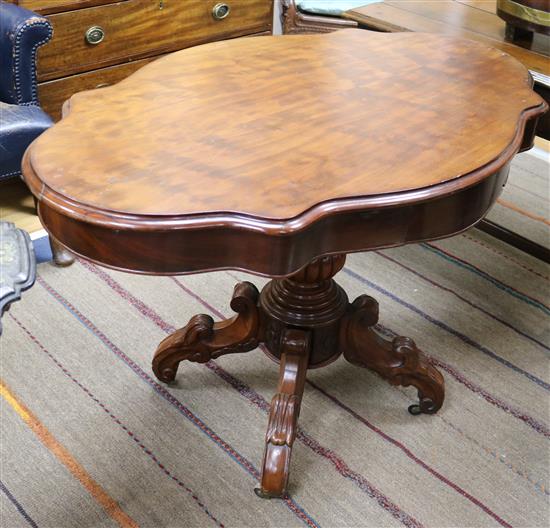 A Victorian serpentine mahogany centre table W.112cm